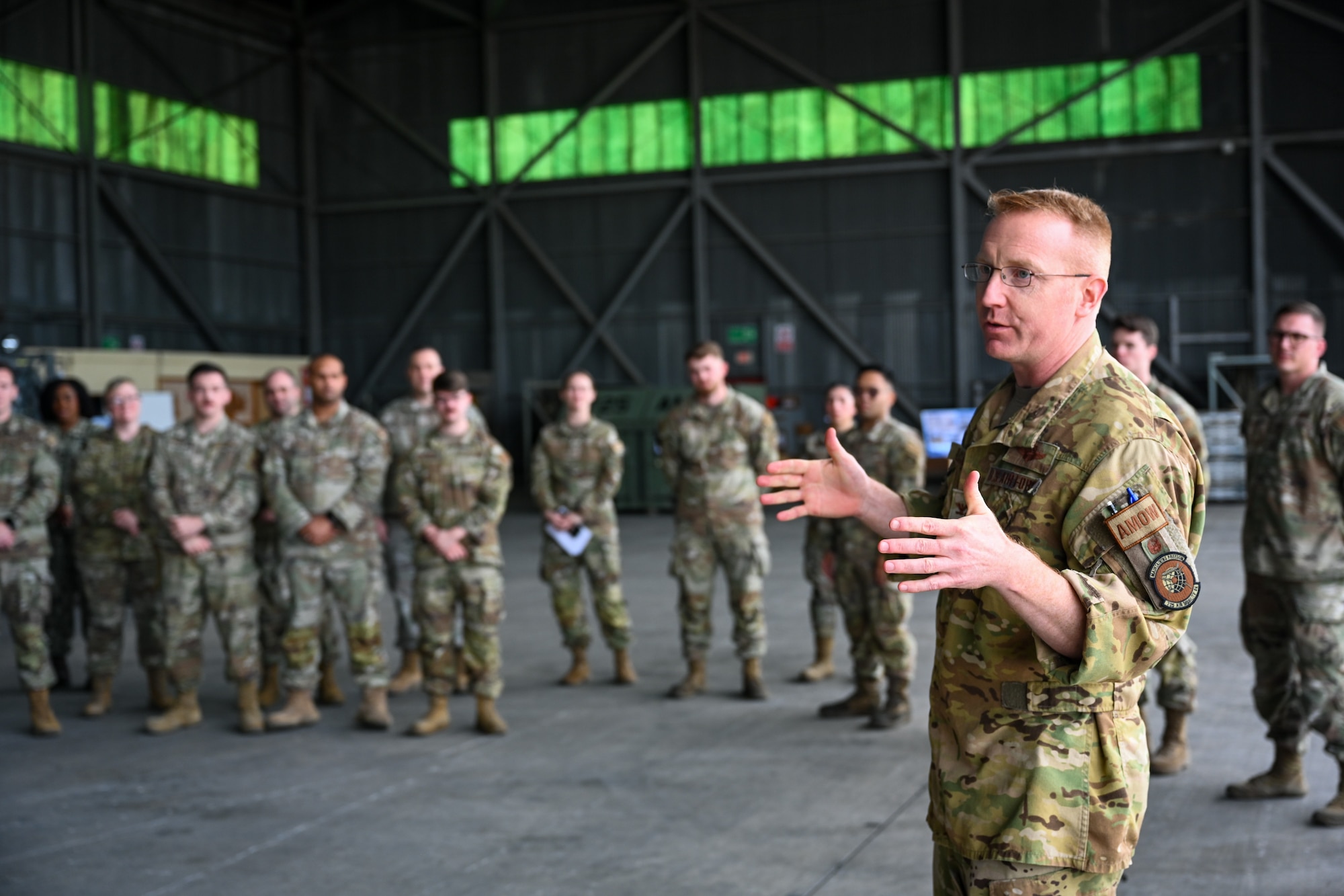 Col. Nicholas Delcour, 521st Air Mobility Operations Wing deputy commander, addresses members participating in Exercise Rising Phoenix, Feb. 7, 2024, at Morón Air Base, Spain.