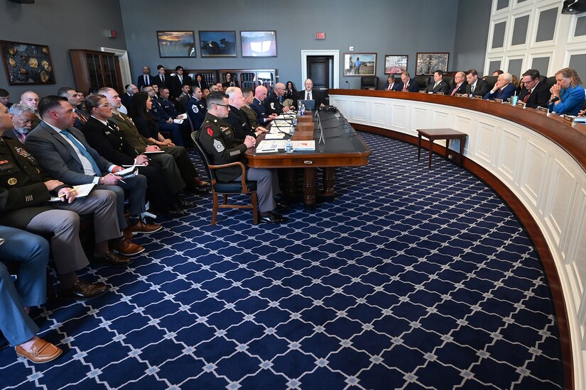 Military officials testify before a committee.