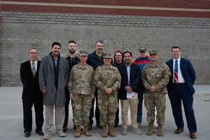 Members of the New Jersey National Guard’s 21st Weapons of Mass Destruction-Civil Support Team, stand for a group photo during the groundbreaking ceremony, marking the start of the new facility construction at Joint Base McGuire-Dix-Lakehurst, N.J., March 20, 2024. The 10,400-square-foot facility will support the 21st WMD-CST's training, administrative, and logistical requirements. This comprises administration, storage, classroom, locker room, break area, latrine/showers, parking, and maintenance areas. (U.S. Air Force photo by Airman 1st Class Aidan Thompson)