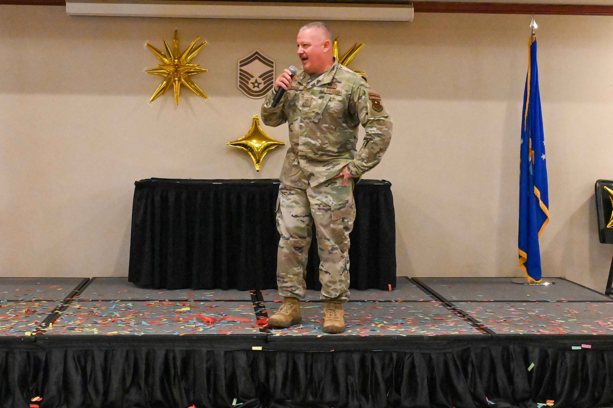 U.S. Air Force Chief Master Sgt. Justin Apticar, 19th Air Force command chief, speaks at the Senior Master Sgt. release party at Altus Air Force Base, Oklahoma, March 13, 2024. Apticar passed along advice he gained from his 30-year Air Force career to the new Senior Master Sgt. selects. (U.S. Air Force photo by Airman 1st Class Kari Degraffenreed)