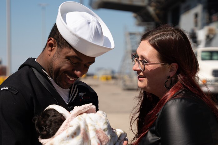 Sailors depart the Wasp-class amphibious assault ship USS Bataan (LHD 5)