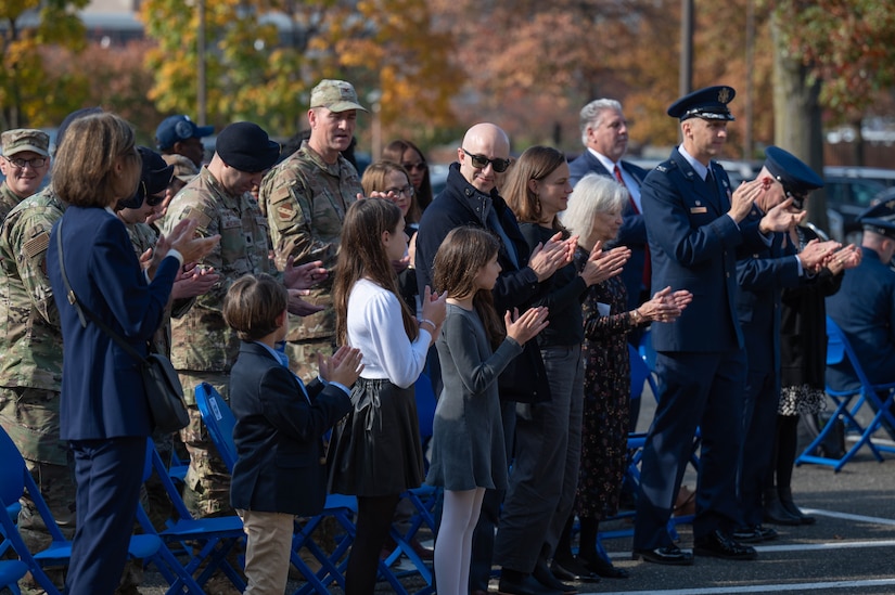 Family members of Joint Base Anacostia-Bolling’s namesake and members of the 11th Wing applaud during closing remarks at the namesake’s statue unveiling ceremony at JBAB, Washington, D.C., Nov. 9, 2023. The late U.S. National Guard Col. Raynal C. Bolling is remembered for creating the first flying units in what would become the Air National Guard, as well as his many contributions to the war effort during World War I. The U.S. Army honored the fallen aviator in 1918 by naming the National Capital Region’s newest aviation facility Bolling Field, which would later become Bolling Air Force Base and then JBAB. (U.S. Air Force photo by Kristen Wong)