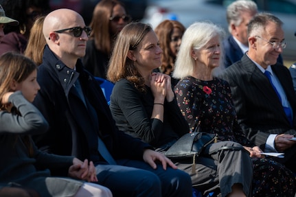 Mary Greene, great-granddaughter of Joint Base Anacostia-Bolling’s namesake, and other members of the Bolling family listen to opening remarks during the namesake’s statue unveiling ceremony at JBAB, Washington, D.C., Nov. 9, 2023. The late U.S. National Guard Col. Raynal C. Bolling is remembered for creating the first flying units in what would become the Air National Guard, as well as his many contributions to the war effort during World War I. The U.S. Army honored the fallen aviator in 1918 by naming the National Capital Region’s newest aviation facility Bolling Field, which would later become Bolling Air Force Base and then JBAB. (U.S. Air Force photo by Kristen Wong)