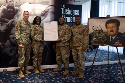 The Joint Base Anacostia-Bolling 11th Wing command team presents the signed Black History Month 2024 Proclamation in the Bolling Club on JBAB, Washington, D.C., Jan. 31, 2024. Black History Month serves as a reminder of the ongoing work toward achieving equality, justice, and understanding among all people. (U.S. Photo by Staff Sgt. Brandon Schneider)