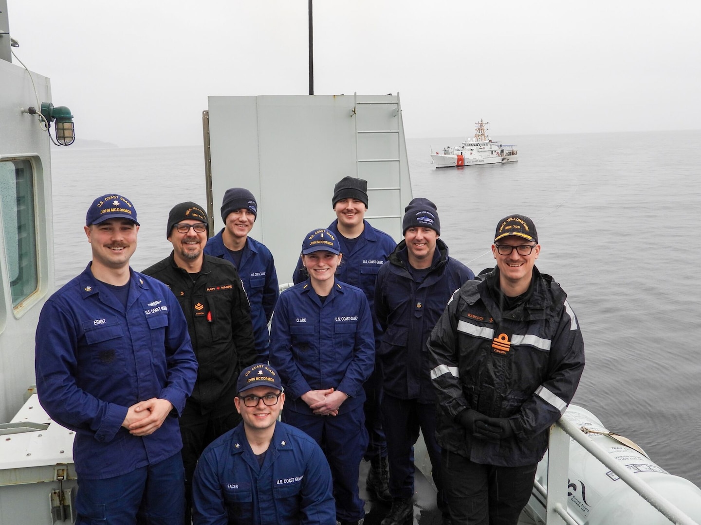 Crewmembers from the U.S. Coast Guard Cutter John McCormick pose for a photo with Royal Canadian Navy Vessel HMCS Yellowknife crewmembers off the coast of Ketchikan, Alaska, March 14, 2024. The objectives of the Coast Guard search and rescue program are to reduce loss of life, injury, and property damage in the maritime setting, minimize risks to responders, maximize resource utilization, and uphold global leadership in maritime search and readiness proficiency and impact. U.S. Coast Guard courtesy photo.