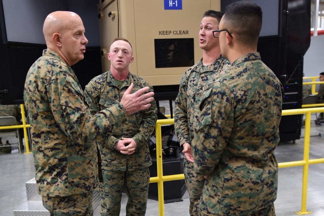 Gen. David Berger, 38th Commandant of the U.S. Marine Corps, talks with Marines with the Motor Transport Instruction Company during his visit to Fort Leonard Wood. (Photo Credit: Photo by Melissa Buckley, Fort Leonard Wood Public Affairs Office)