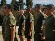 U.S. Marine Corps recruits with Lima Company, 3rd Recruit Training Battalion, Recruit Training Regiment, stand in formation during a physical training event at Marine Corps Recruit Depot San Diego, California, March 19, 2024. Physical training challenges recruits to strengthen themselves physically and mentally. (U.S. Marine Corps photo by Cpl. Elliott A. Flood-Johnson)