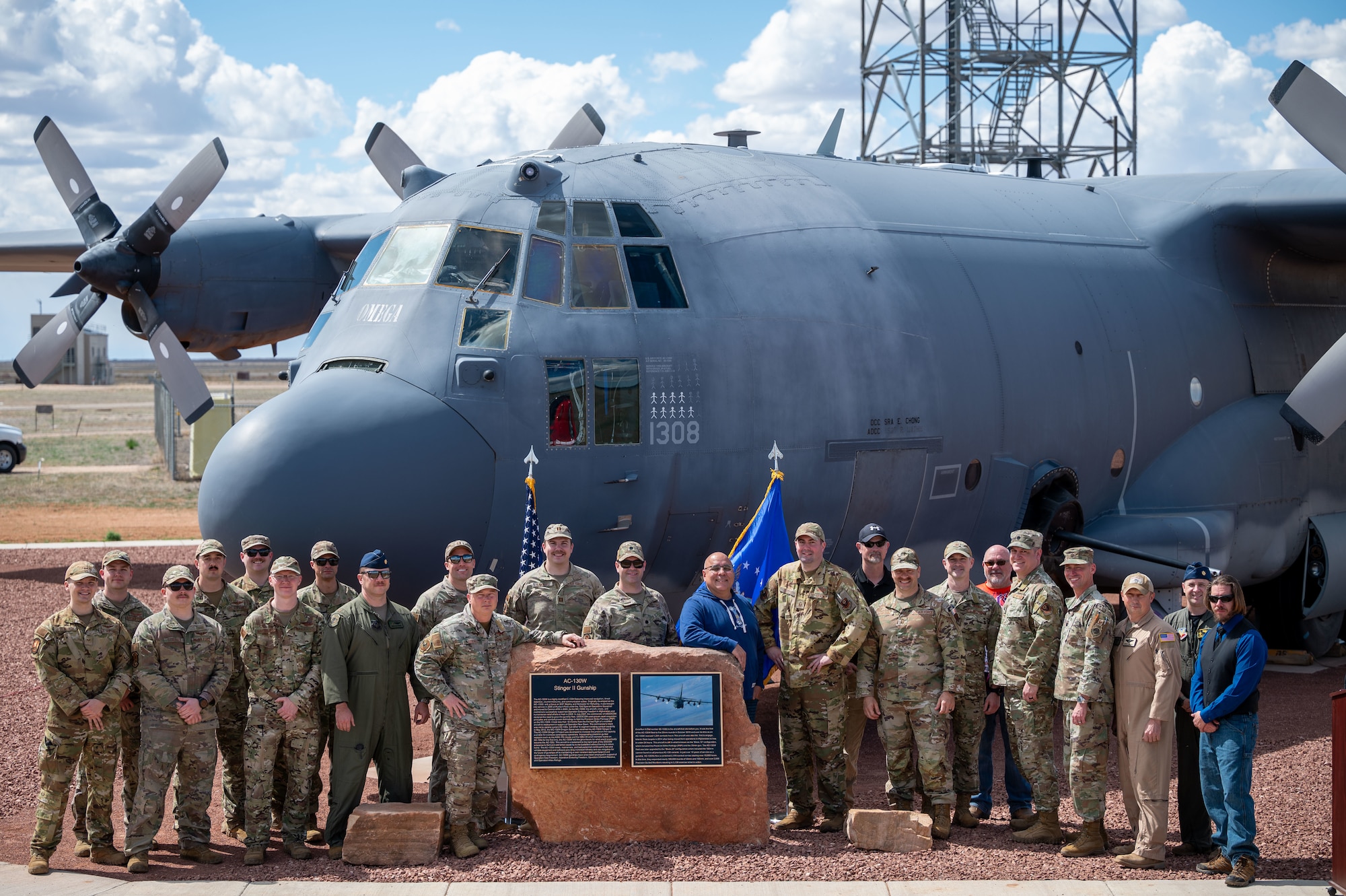 Members from the 27th Special Operations Wing and the 1st Special Operations Wing gather for a photo after a ceremony unveiling the AC-130W Stinger II gunship static display at Cannon Air Force Base, New Mexico, March 21, 2024. In over 10 years of service as a gunship, the AC-130W flew a combined 2,170 combat sorties, totaling over 15,000 hours. (U.S. Air Force photo by 2nd Lt. Charles Moye)