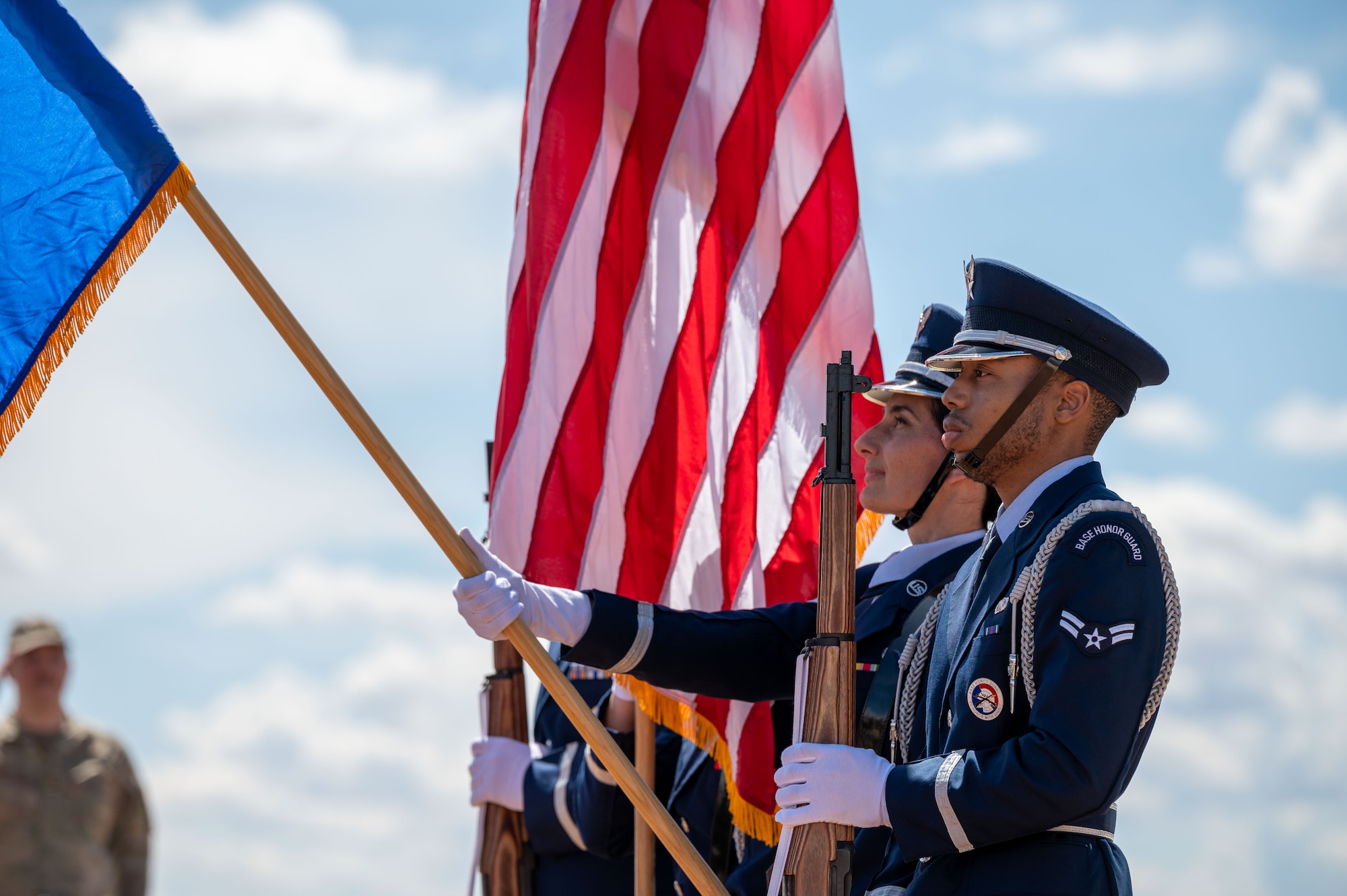 The Cannon Air Force Base Honor Guard presents the colors during the AC-130W Stinger II gunship static display unveiling at Cannon Air Force Base, New Mexico, March 21, 2024. The AC-130W Stinger II flew combat missions in support of Operation NEW DAWN, Operation ENDURING FREEDOM, Operation INHERENT RESOLVE, and more. (U.S. Air Force photo by 2nd Lt. Charles Moye)