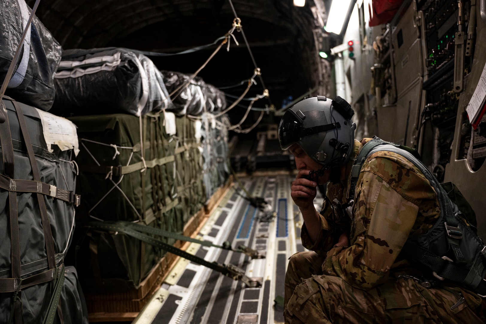 U.S. Air Force Airmen and U.S. Army Central Command Soldiers prepare humanitarian aid for airdrop aboard a U.A. Air Force C-17 Globemaster III at an undisclosed location in the U.S. Central Command area of responsibility, March 21st, 2024. Joint Base Charleston deployed C-17s to further enhance airdrop efforts to deliver humanitarian aid into Gaza. In the Coalition’s effort to support civilians suffering from the hardships of continued conflict in Gaza, the U.S. delivered aid via airdrop to ensure expedited delivery and access to critical aid. (U.S. Air Force photo by Staff Sgt Christian Sullivan)