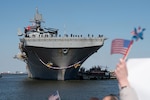 The Wasp-class amphibious assault ship USS Bataan (LHD 5), assigned to the Bataan Amphibious Ready Group (ARG), returns to Naval Station Norfolk following an eight and a half-month deployment operating in the U.S. 5th and U.S. 6th Fleet areas of operation, March 21, 2024. More than 4,000 Sailors and Marines assigned to the Bataan ARG supported a wide range of interoperability opportunities and exercises, increasing combat readiness and crisis response capabilities while strengthening relationships with NATO Allies and partners. (U.S. Navy photo by Mass Communication Specialist 2nd Class Anderson W. Branch)