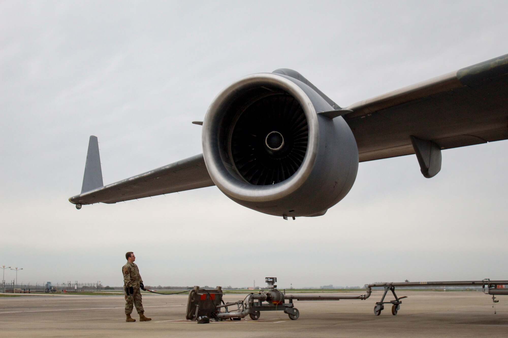 A U.S. Air Force service member refuels a C-17 Globemaster III during Exercise Rising Phoenix, Feb. 8, 2024, at Morón Air Base, Spain.