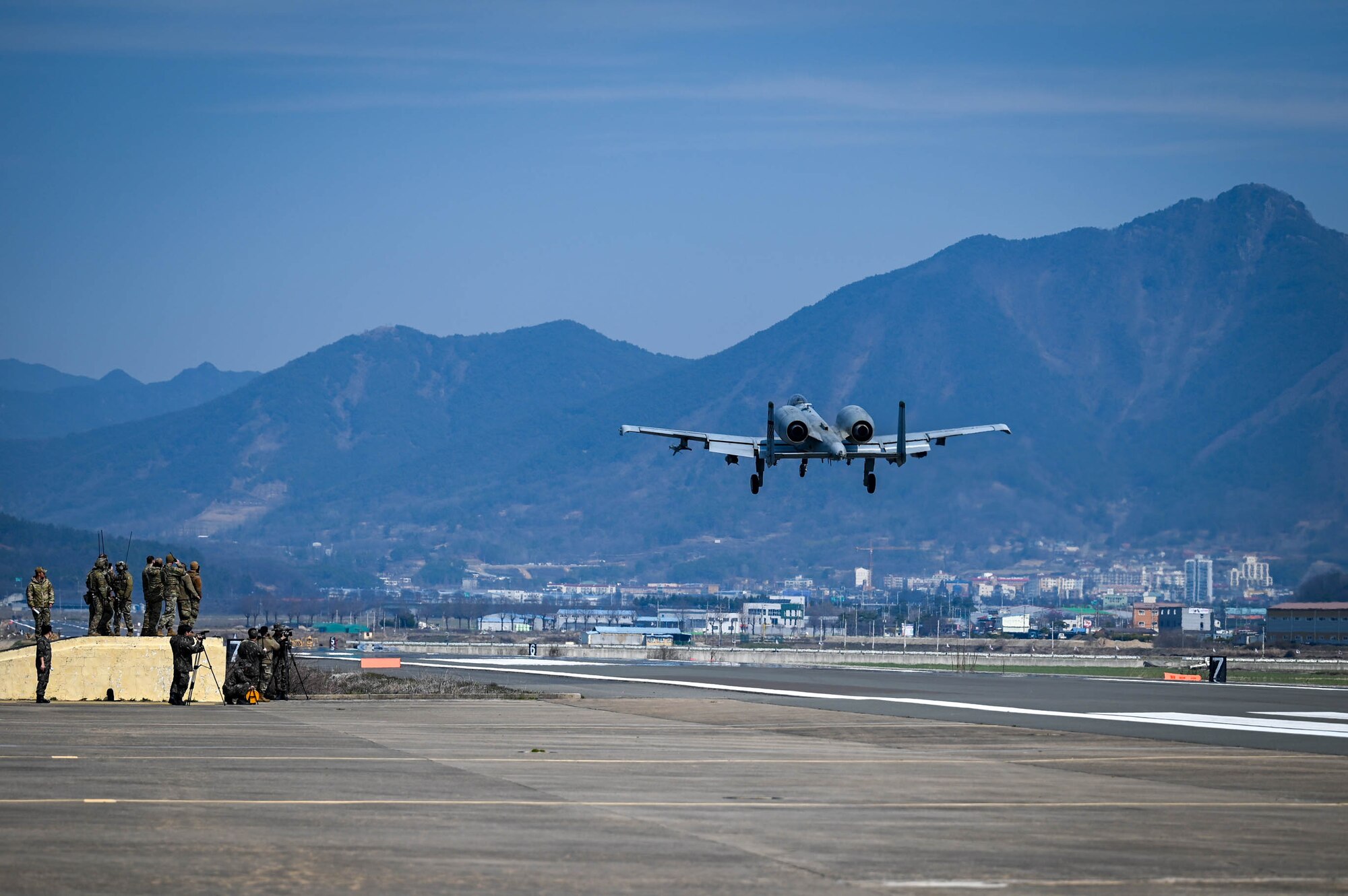 An A-10 Thunderbolt II “Warthog” from the 25th Fighter Squadron performs a low pass over an emergency landing site training event near Namji, Republic of Korea, March 13, 2024.