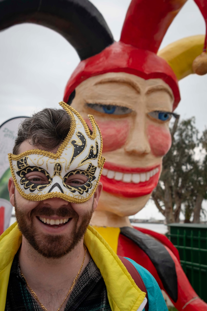 Mass communication Specialist 1st Class Michael Eckelbecker, assigned to American Forces Network Souda Bay, Greece, celebrates Carnival by attending a huge parade  on March 17, 2024.