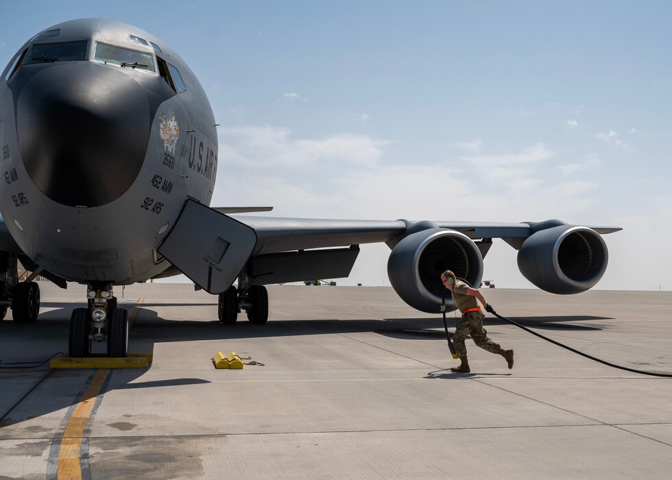 U.S. Air Force crew chief pulls an electric cord at an undisclosed location in the U.S. Central Command area of responsibility, Mar. 21, 2024. Crew chiefs play a crucial role in conducting pre-flight inspections and post-flight maintenance to guarantee aircraft safety and operational readiness. (U.S. Air Force photo)