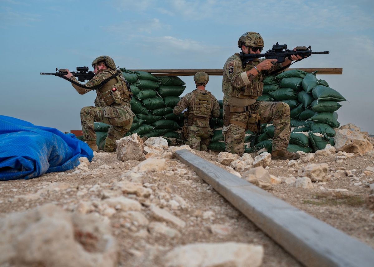 U.S. Air Force Expeditionary Security Forces defenders perform security procedures during an Agile Combat Employment readiness course at an undisclosed location in the U.S. Central Command area of responsibility, March 14, 2024. Security forces play a vital role in establishing a bare base, ensuring its security, implementing perimeter defenses, conducting threat assessments and coordinating with other units to swiftly establish operational capabilities. (U.S. Air Force courtesy photo)