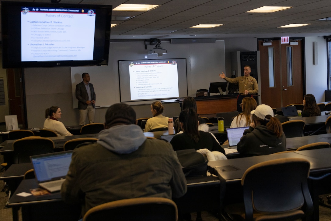 U.S. Marine Major Branden Koonce, the commanding officer of Recrutiing Station Chicago provides remarks after a lecture presented by Captain Jhonathan Morales, a Staff Judge Advocate with Marine Corps Recruiting Command, at Kent Law School, Chicago, IL, Feb. 29, 2024. As a part of a three day lecture circuit Morales visited University of Illinois Chicago, Northwestern University and Chicago-Kent University to give a presentation on practicing law as a part of expeditionary advanced base operations. (U.S. Marine Corps Photo by Sgt. Dalton J. Payne)