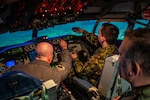 A delegation of Serbian Armed Forces cyber professionals visit Airmen of the 121st Air Refueling Wing at Rickenbacker Air National Guard Base, Ohio, March 6, 2024. During their visit as part of the State Partnership Program, the Serbians toured a KC-135 Stratotanker and tried a flight simulator.