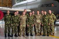 A delegation of Serbian Armed Forces cyber professionals visit Airmen of the 121st Air Refueling Wing at Rickenbacker Air National Guard Base, Ohio, March 6, 2024. During their visit as part of the State Partnership Program, the Serbians toured a KC-135 Stratotanker and used a flight simulator.