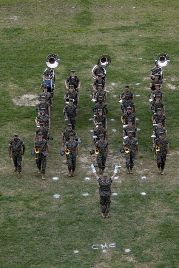 U.S. Marines with the Marine Forces Reserve Band march during the Marine Forces Reserve and Marine Forces South change of command ceremony at the Marine Corps Support Facility, New Orleans, March 21, 2024. Lt. Gen. David G.Bellon, outgoing commander of Marine Forces Reserve and Marine Forces South, relinquished his duties to Lt. Gen. Leonard F. Anderson IV after 35 years of faithful service to the Marine Corps. (U.S. Marine Corps photo by Lance Cpl. David Intriago)