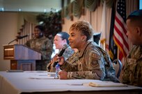 U.S. Air Force Chief Master Sgt. Andriea Cook, 305th Operations Group Senior Enlisted Leader, answers questions during the Women’s Empowerment forum at Joint Base McGuire-Dix-Lakehurst, N.J., March 18, 2024. The focus of this year’s event was Overcoming Adversity Through Advocacy. (U.S. Air Force photo by Jewaun Victor)