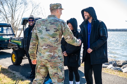 U.S. Air Force Col. Ryan Crowley, Joint Base Anacostia-Bolling and 11th Wing commander, thanks teammates with the 11th Force Support Squadron for their installation of seven new outdoor fitness stations along the Bolling Green Park Waterfront. Crowley expressed his appreciation for their contributions to the project at a ribbon cutting ceremony held on JBAB on Feb. 24, 2024.