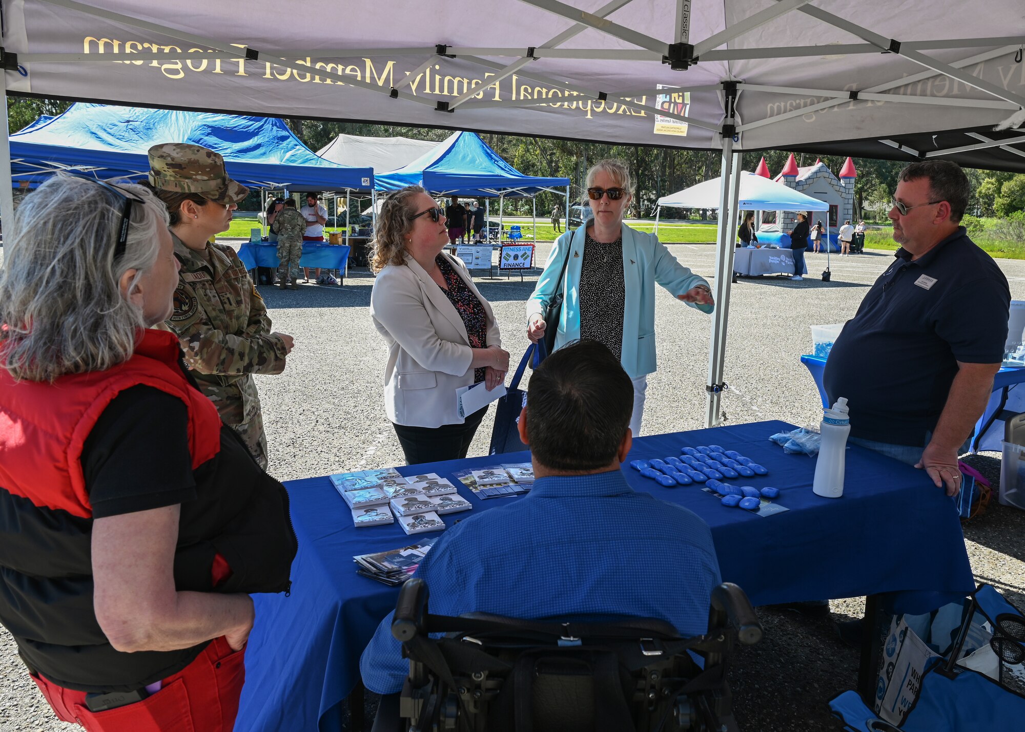 Members of the Exceptional Family Member Program speak with the spouse of Space Systems Command commander and the spouse of the Space Launch Delta 30 commander, during the first 30th Medical Group Health Fair at Vandenberg Space Force Base.