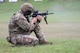 Man in U.S. Army uniform on outdoor rifle range.
