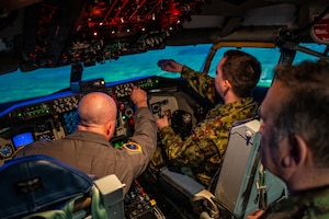 A delegation of Serbian Armed Forces cyber professionals visit Airmen of the 121st Air Refueling Wing at Rickenbacker Air National Guard Base, Ohio, March 6, 2024. During their visit as part of the State Partnership Program, the Serbians toured a KC-135 Stratotanker and tried a flight simulator.