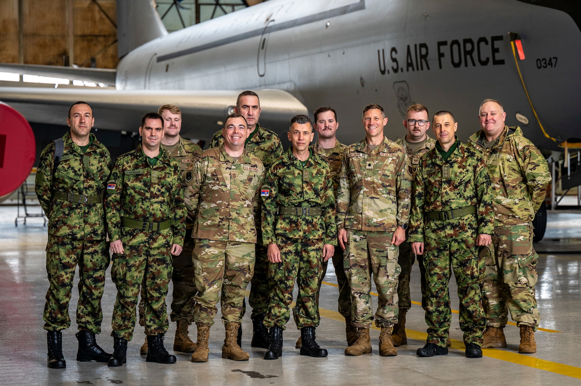 A delegation of Serbian Armed Forces cyber professionals visit Airmen of the 121st Air Refueling Wing at Rickenbacker Air National Guard Base, Ohio, March 6, 2024. During their visit as part of the State Partnership Program, the Serbians toured a KC-135 Stratotanker and used a flight simulator.