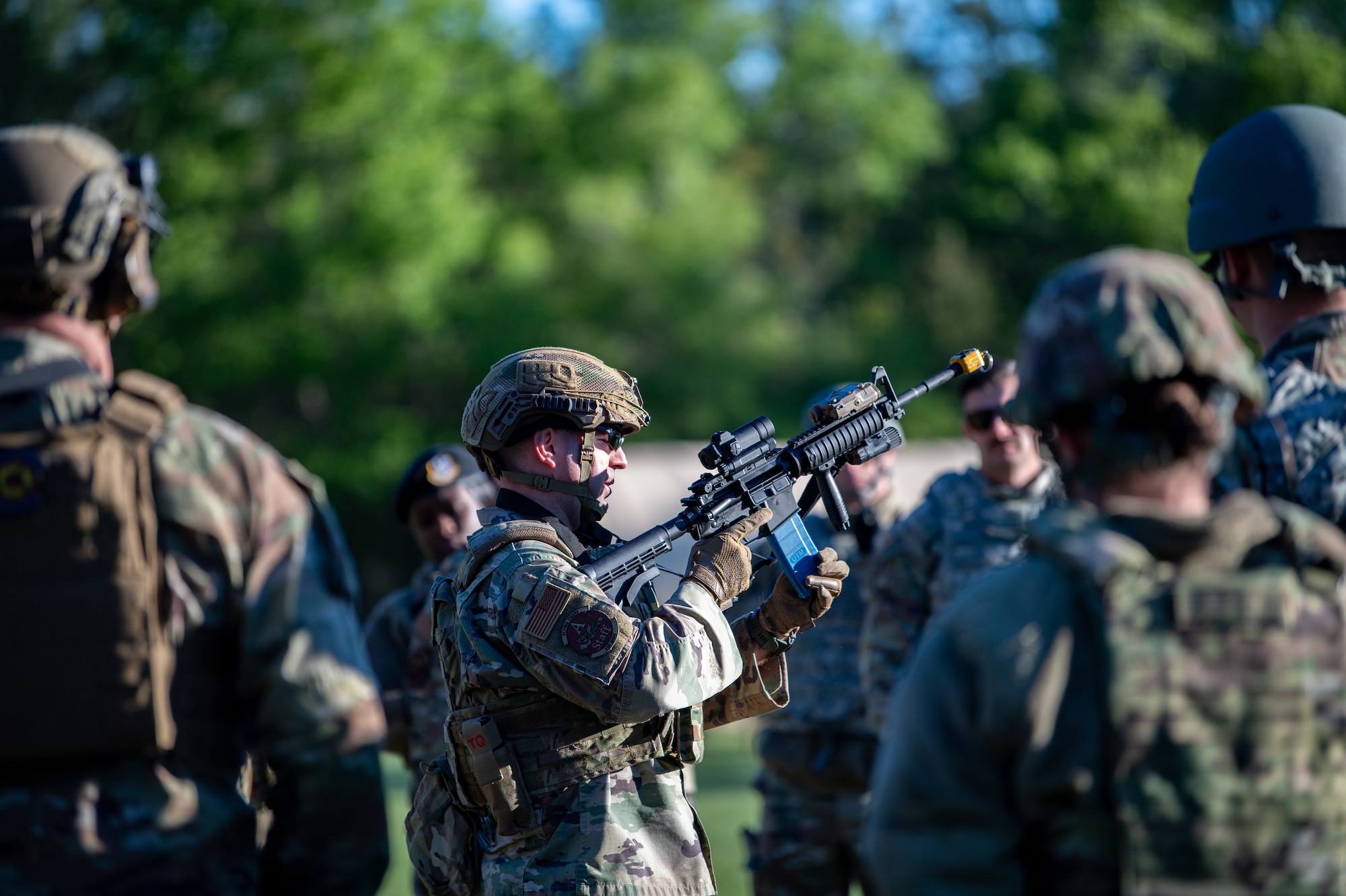 An Airman reloads a magazine