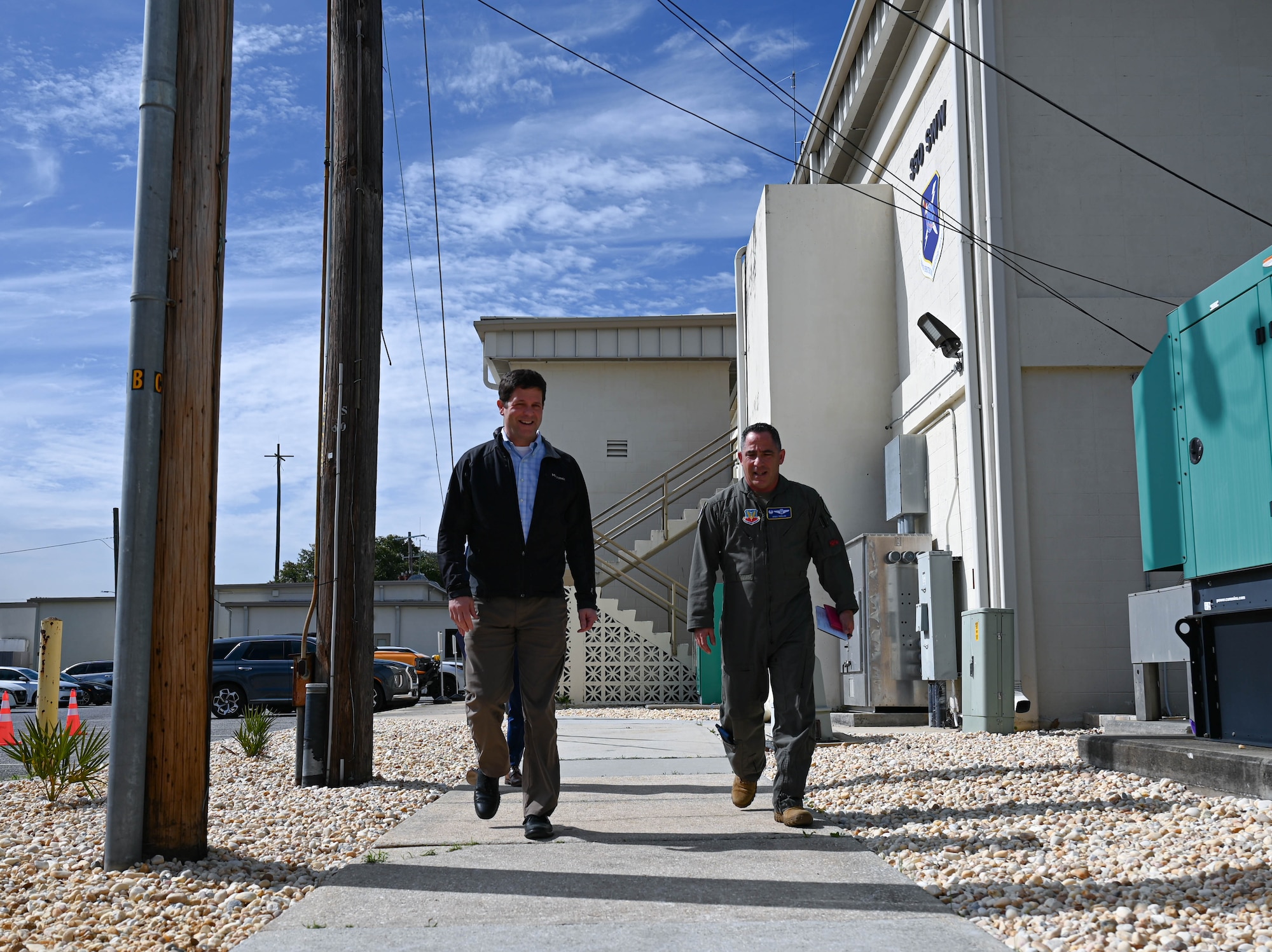 Dr. John Plumb, Assistant Secretary of Defense for Space Policy, walks alongside U.S. Air Force Col. Josh Koslov, 350th Spectrum Warfare Wing commander, during a visit to the 350th SWW at Eglin Air Force Base, Fla., March 11, 2024. Plumb’s portfolio encompasses the DOD’s strategic capabilities for integrated deterrence: space and missile defense, nuclear weapons, countering weapons of mass destruction, and, at the time of publication, , electromagnetic warfare and cyber. (U.S. Air Force photo by Capt. Benjamin Aronson)