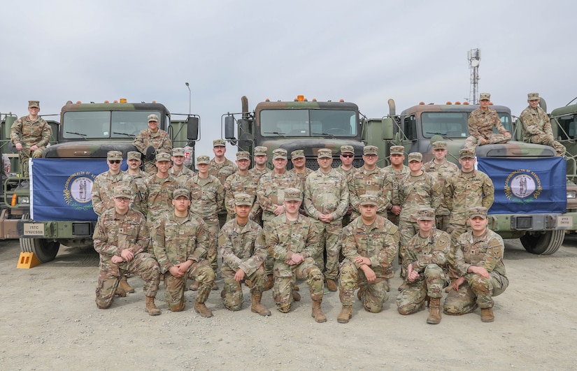 Soldiers with the 2113th Transportation Company who are currently deployed to in Mihail Kogălniceanu, Romania, gathered for a group photo with the Adjutant General for Kentucky, Army Maj. Gen Haldane Lamberton, and the other Kentucky Guard leaders that came out to visit them Feb. 25, 2024
