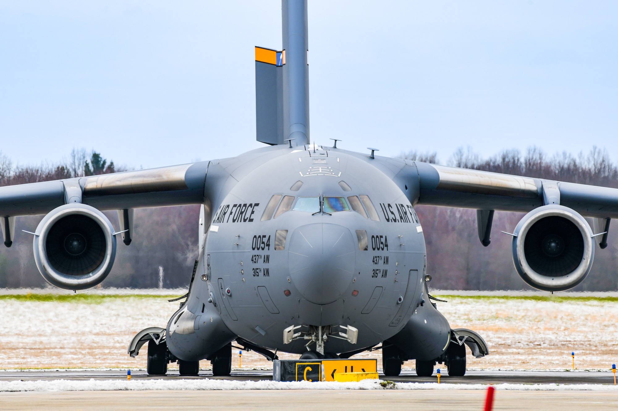 A C-17 Globemaster III based at Joint Base Charleston, South Carolina, lands at Youngstown Air Reserve Station, Ohio, March 19, 2024, to pick up troops and cargo.