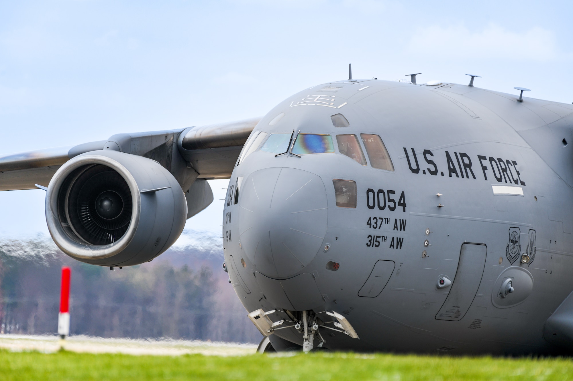 A C-17 Globemaster III based at Joint Base Charleston, South Carolina, lands at Youngstown Air Reserve Station, Ohio, March 19, 2024, to pick up troops and cargo.