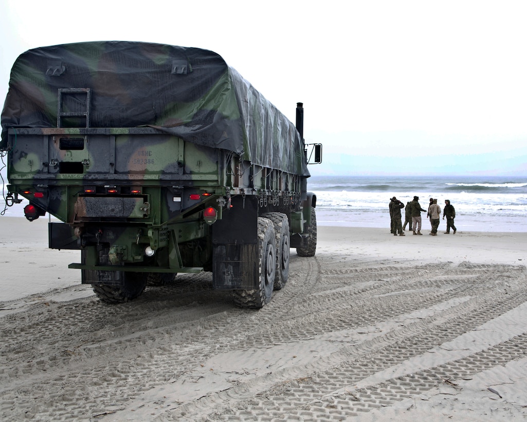 A 7-Ton Truck Medium Tactical Vehicle Replacement (MTVR) is placed at Onslow Beach, Camp Lejeune, N.C. The MTVR was utilized during a live-fire training exercise for 2D Low Altitude Air Defense Battalion. (U.S. Marine Corps photo by Lance Cpl. Austin A. Lewis/Released)