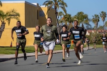 U.S. Marines and civilians with Marine Corps Recruit Depot San Diego participate in the St. Patrick's Day 5k fun run at MCRD San Diego, California, March 15, 2024. The St. Patrick’s Day 5k fun run is one of many events hosted on the Depot designed to build unit morale and boost esprit de corps. (U.S. Marine Corps photo by Lance Cpl. Janell B. Alvarez)