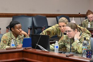 Volunteers and leaders at Air Combat Command 2024 Sword Athena Summit.