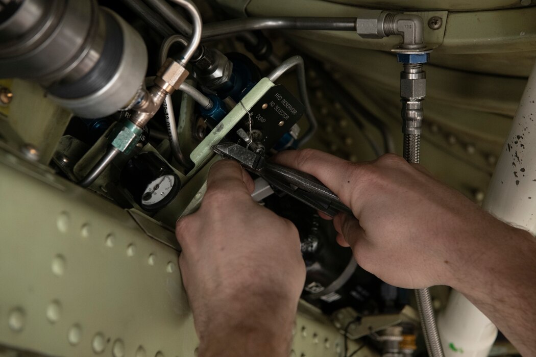 U.S Air Force Staff Sgt. Matthew Sharber, 9th Aircraft Maintenance Squadron U-2 Dragon Lady crew chief, fixes the wiring of TU-2S Dragon Lady 1078 after almost three years of maintenance to restore the two-seater U-2 at Beale Air Force Base, California, Jan. 25, 2024.