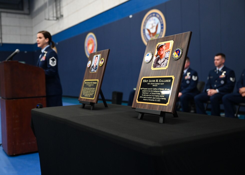 U.S. Air Force Master Sgt. Jessica Abad, 316th Training Squadron instructor, speaks during the 316th TRS Plaque Dedication Ceremony to honor Technical Sgt. Ernest R. Parrish and Staff Sgt. Jacob M. Galliher, at the Mathis Gymnasium, Goodfellow Air Force Base, Texas March 15, 2024. Galliher was one of eight crewmembers killed in November 2023, when his CV-22 Osprey crashed off the coast of Japan. (U.S. Air Force photo by Airman 1st Class Evelyn J. D’Errico)