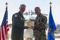 Airmen pose for a photo.