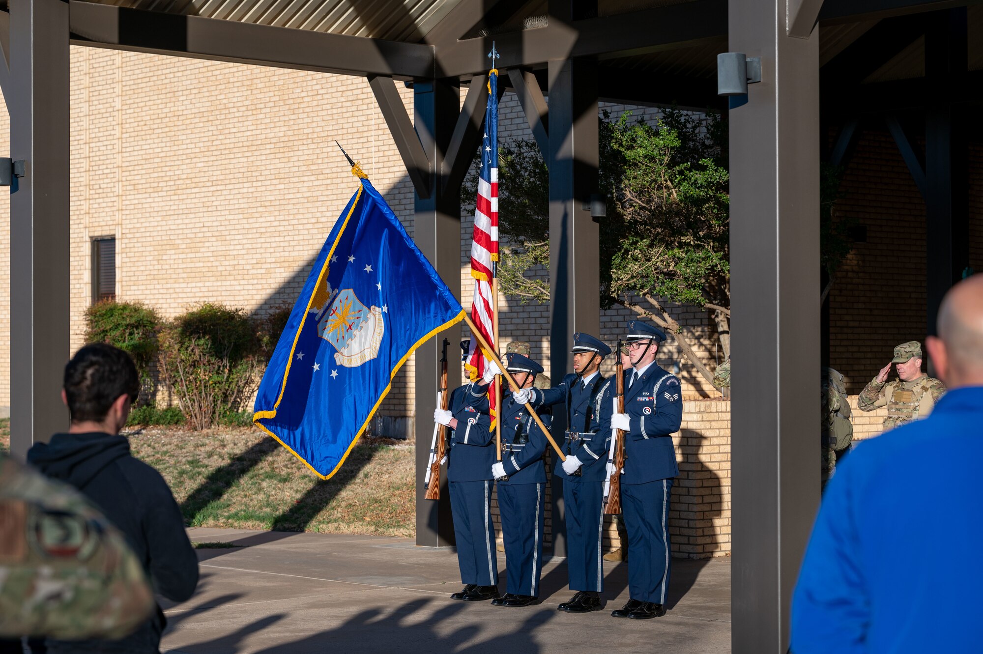 The Cannon Air Force Base Honor Guard presents the colors before the 3rd Annual Steadfast Ruck March, at Cannon AFB, N.M., March 22, 2024. The memorial event included a 16-mile relay ruck, an 8-mile individual ruck, and a 5-kilometer run. (U.S. Air Force photo by 2nd. Lt. Charles Moye)