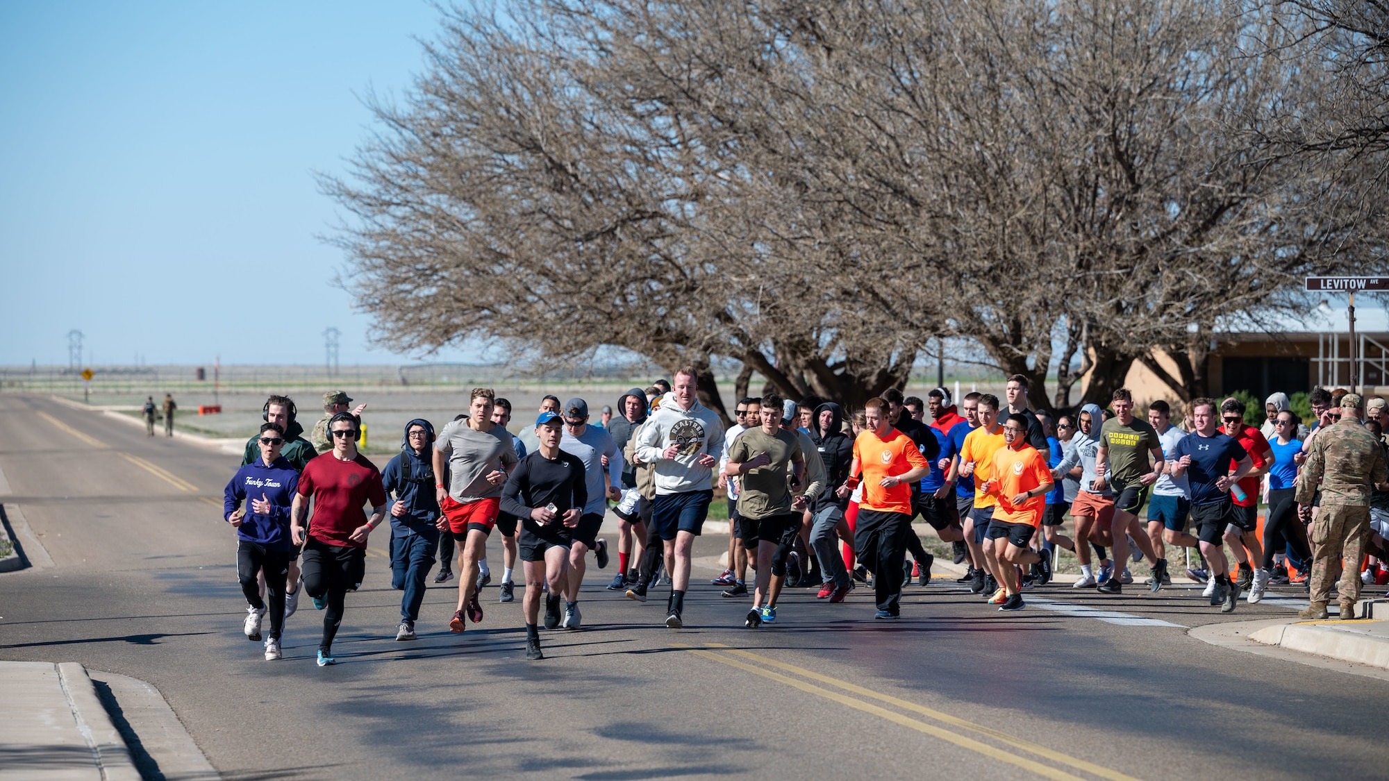 Airmen from the 27th Special Operations Wing ran a 5-kilometer run during the 3rd Annual Steadfast Ruck March at Cannon Air Force Base, N.M, March 22, 2024. Over 500 Air Commandos, family members, and local community members participated in the event. (U.S. Air Force photo by 2nd Lt. Charles Moye)