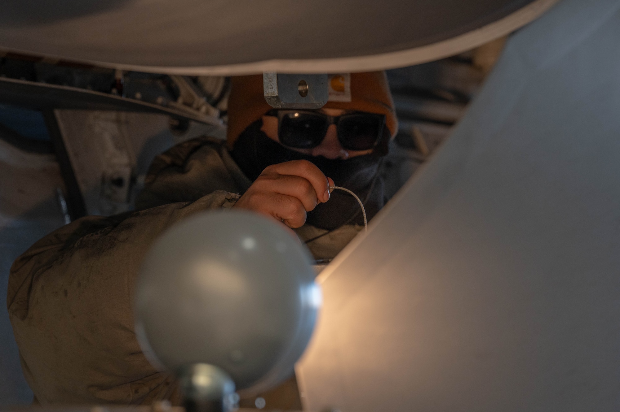 U.S. Air Force Staff Sgt. Justin Duran, 355th Fighter Generation Squadron weapons load crew chief, prepares an aircraft for loading during Arctic Gold 24-2 at Eielson Air Force Base, Alaska, March 20, 2024.