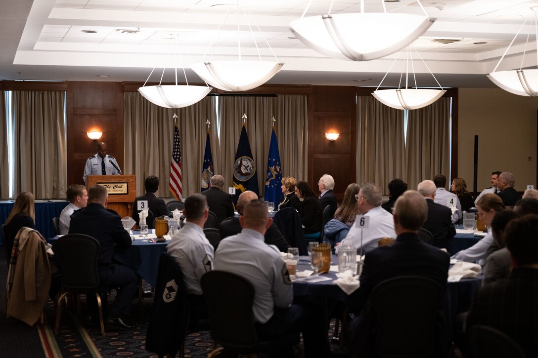 U.S. Air Force Col. Todd E. Randolph, 316th Wing and installation commander, addresses attendees during the honorary commander induction ceremony at Joint Base Andrews, Md., March 21, 2024.