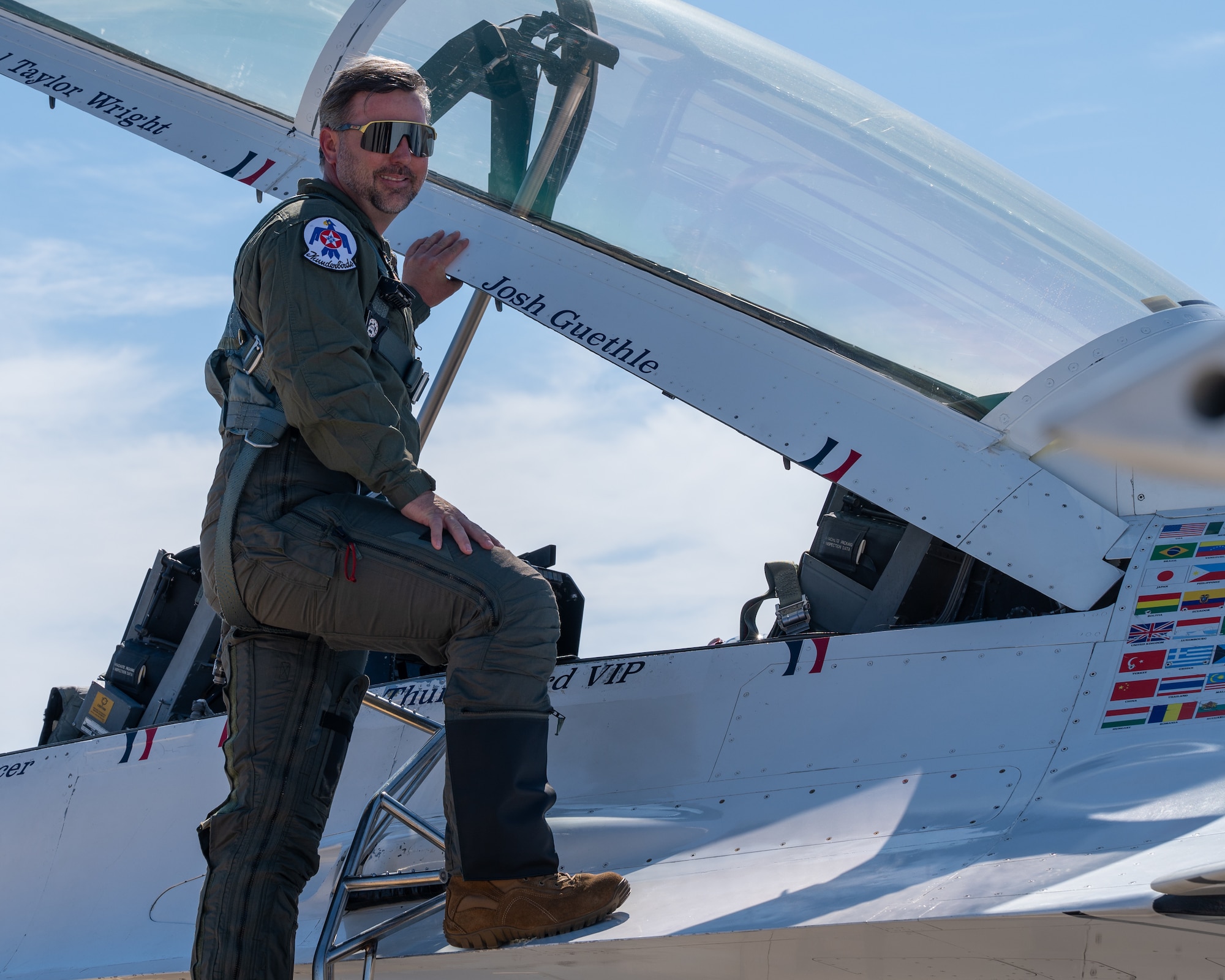 Josh Guethle, Goodyear community hometown hero, climbs into the cockpit of an U.S. Air Force F-16 Fighting Falcon assigned to the U.S. Air Force Demonstration team, the "Thunderbirds," during the Luke Days airshow on March 22, 2024, at Luke Air Force Base, Arizona.