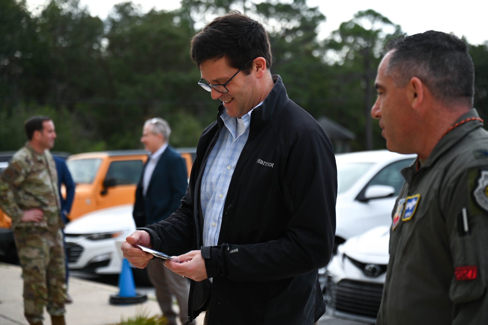 Dr. John Plumb, Assistant Secretary of Defense for Space Policy, receives a unit patch from U.S. Air Force Col. Josh Koslov, 350th Spectrum Warfare Wing commander, during a visit to the 350th SWW at Eglin Air Force Base, Fla., March 11, 2024. Plumb’s portfolio encompasses the DOD’s strategic capabilities for integrated deterrence: space and missile defense, nuclear weapons, missile defense, countering weapons of mass destruction, and, at the time of publication, electromagnetic warfare and cyber. (U.S. Air Force photo by Capt. Benjamin Aronson)