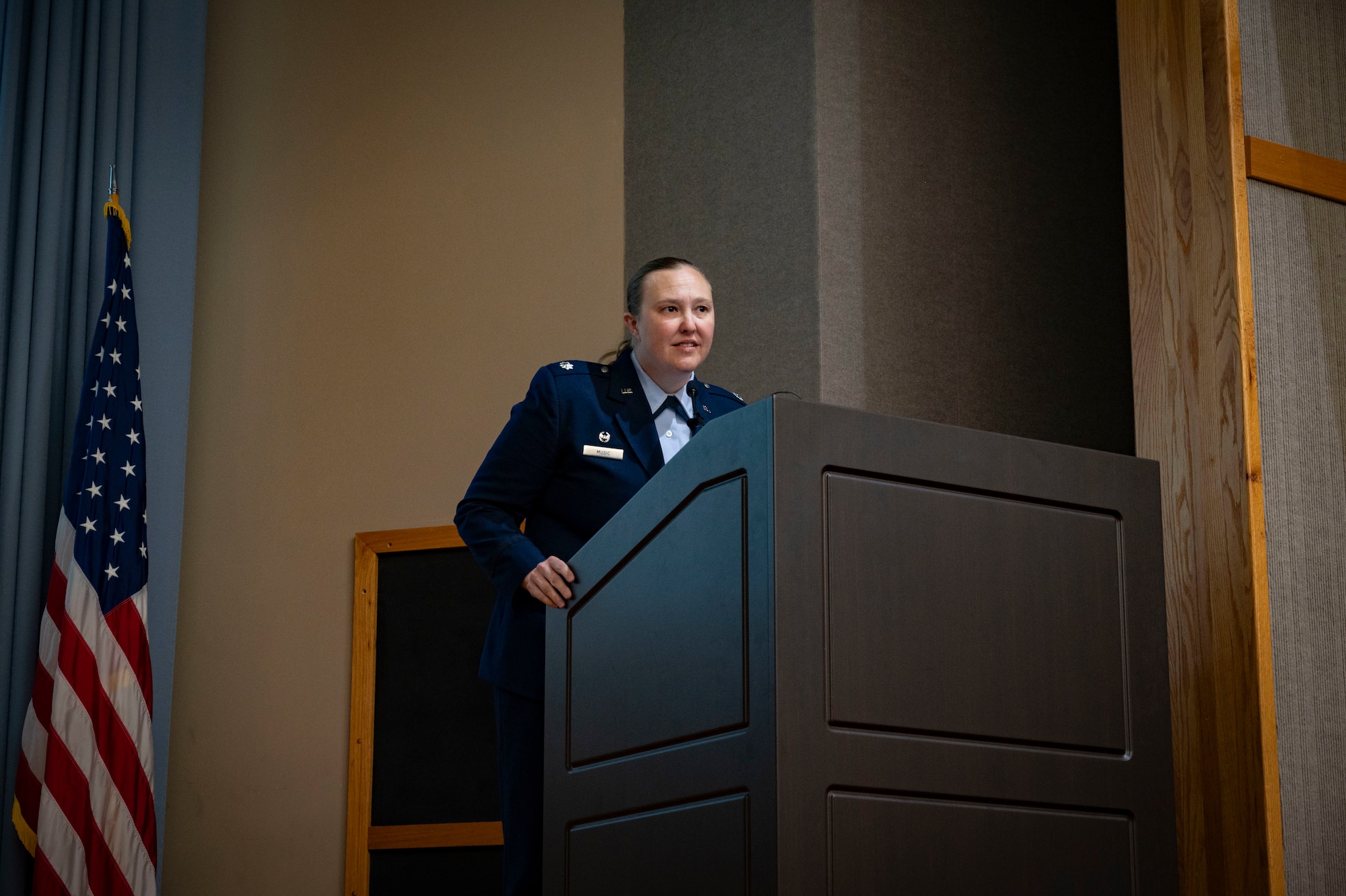 U.S. Air Force Lt. Col. Elizabeth Music, 47th Student Squadron commander, leads the “Breaking of the Wings” tradition during the Class 24-07 Undergraduate Pilot Training graduation ceremony at Laughlin Air Force Base, Texas, March 22, 2024. The “Breaking of the Wings” is a tradition said to bring good fortune throughout a pilot’s career. One half of the wings is kept by the new pilot, and the other half is given to someone of significance in their lives. (U.S. Air Force photo by Senior Airmen Kailee Reynolds)