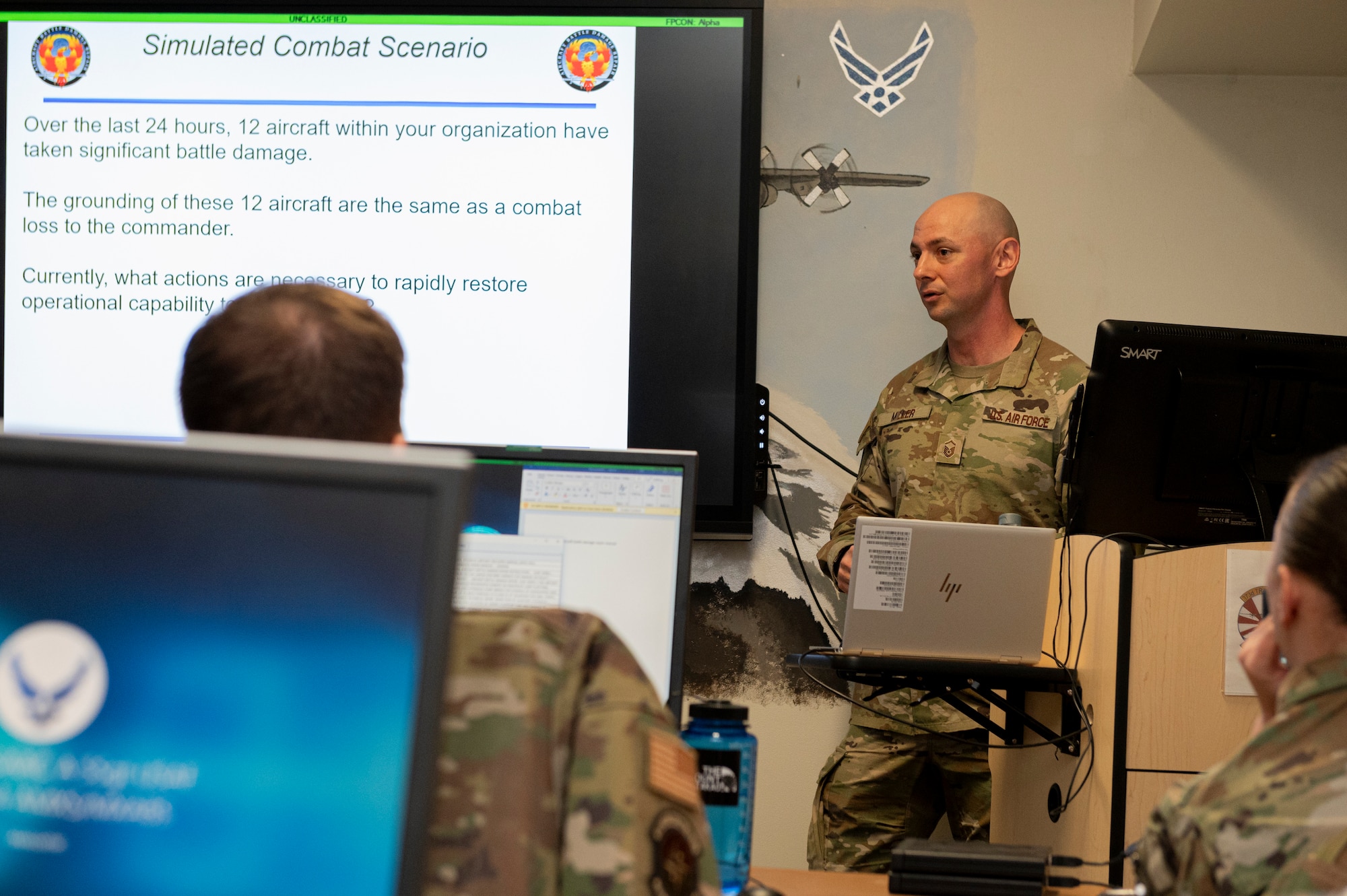 An Airman gives an introduction during an Aircraft Battle Damage Repair course