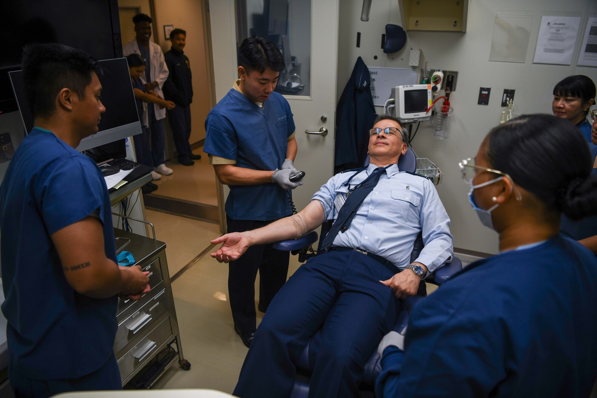 18th Dental Squadron commander participates in an IV placement exercise.